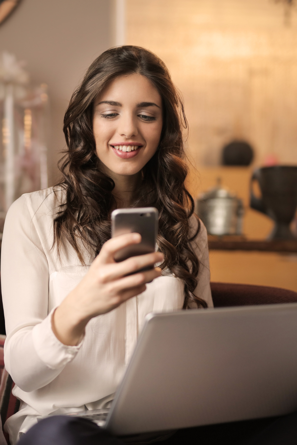 girl with phone and computer